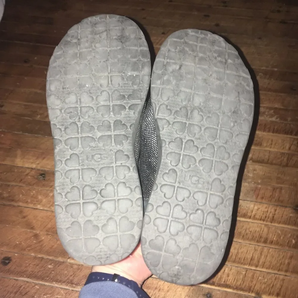 Uggs size 4 shimmery black and silver shearling lined booties